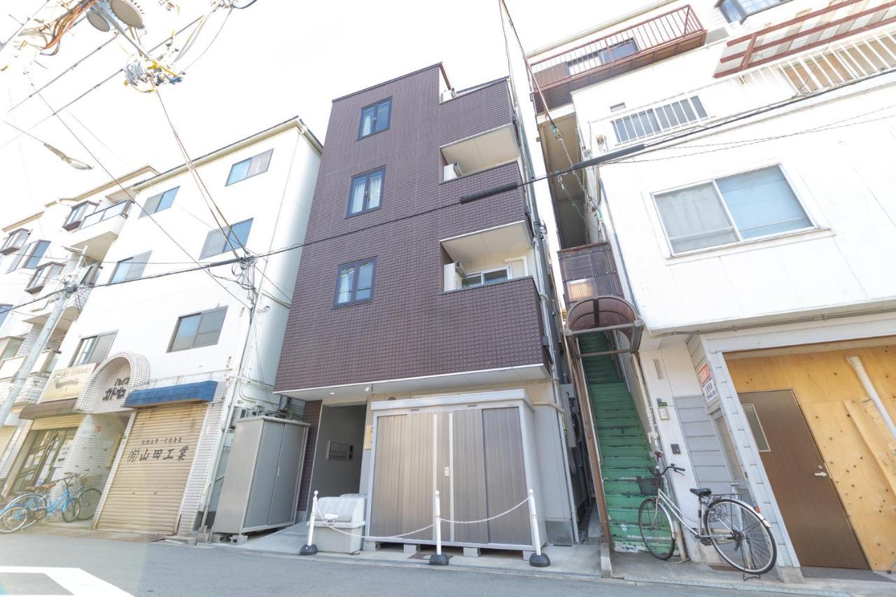 Guest House Nisso Osaka Buitenkant foto